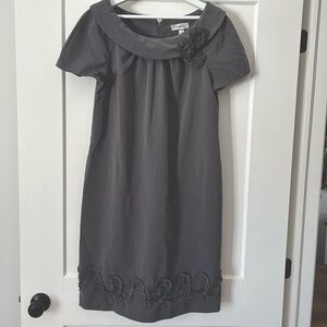 Charcoal grey dress with floral detail.